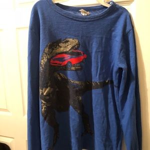 Long sleeved blue Dino shirt.